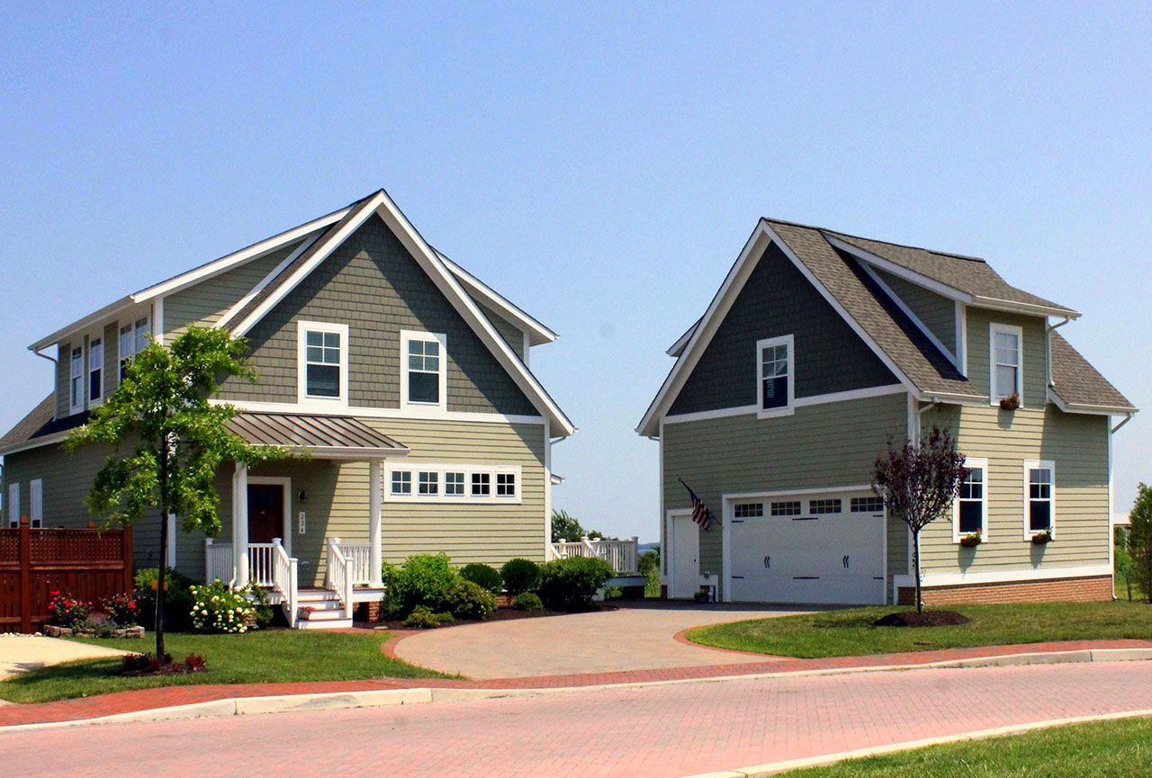 Tan home exterior with garage | Sawgrass Legacy | Covell Communities | Chester, Maryland 21619