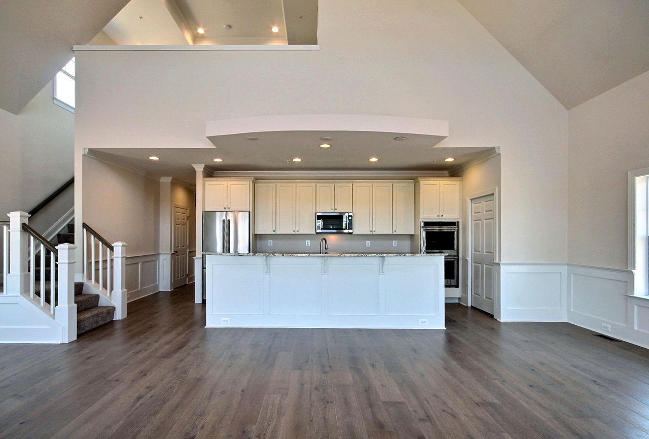 Vaulted living room and kitchen with island | Sawgrass Legacy | Covell Communities | Chester, Maryland 21619