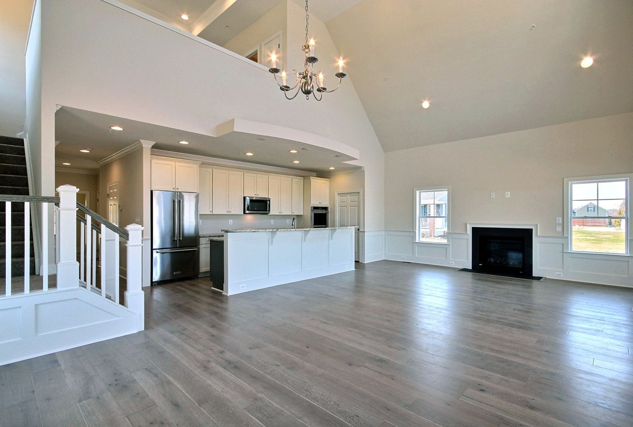 Open living room and kitchen with island | Sawgrass Legacy | Covell Communities | Chester, Maryland 21619