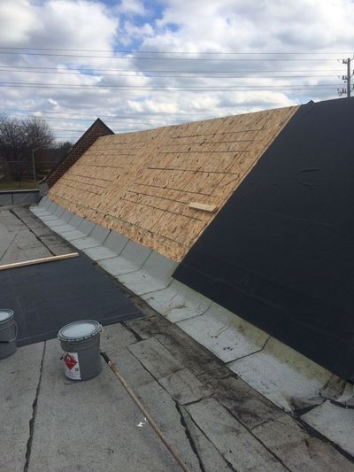 Worker Installing Shingles Roof — Indianapolis, IN — Brown's Roofing, Inc. Worker Installing Shingles Roof — Indianapolis, IN — Brown's Roofing, Inc.