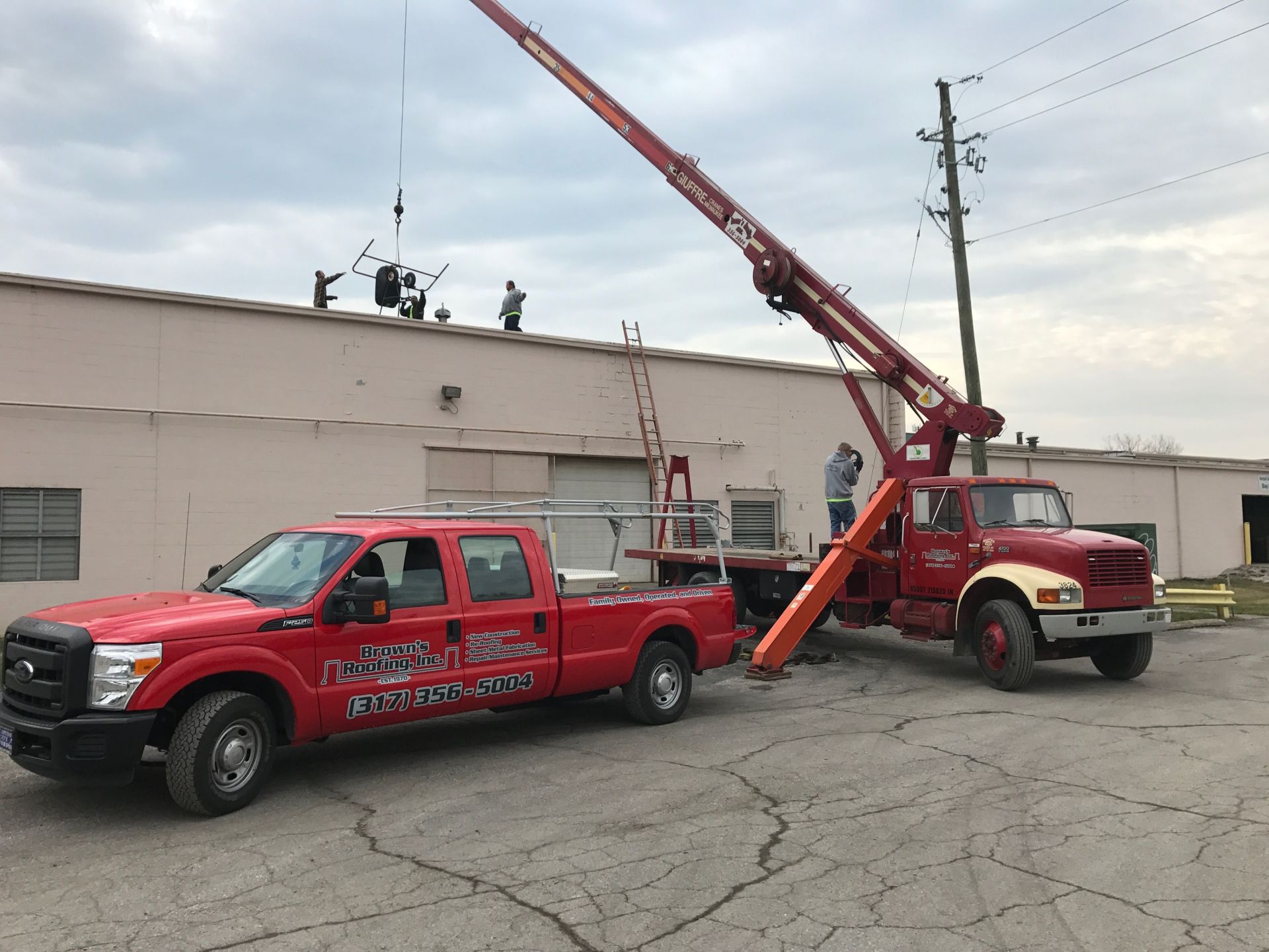 Roofing Contractors Repairing Roof — Indianapolis, IN — Brown's Roofing, Inc. Roofing Contractors Repairing Roof — Indianapolis, IN — Brown's Roofing, Inc.