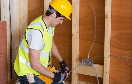 Electrician Working with Wiring — Electrician nc in Hickory, NC Electrician Working with Wiring — Electrician nc in Hickory, NC