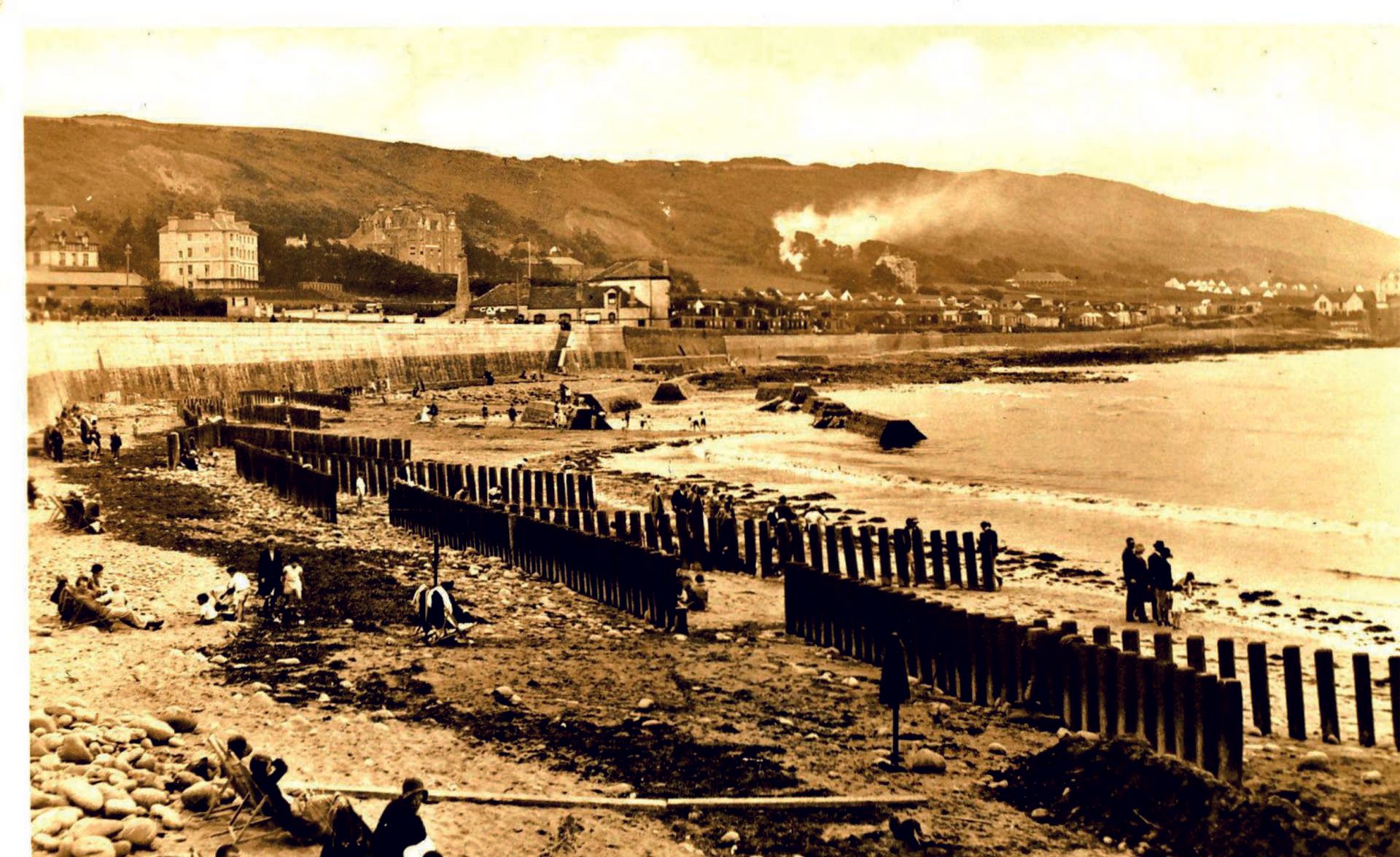Westward Ho! Hotel in the background with break waters on the beack