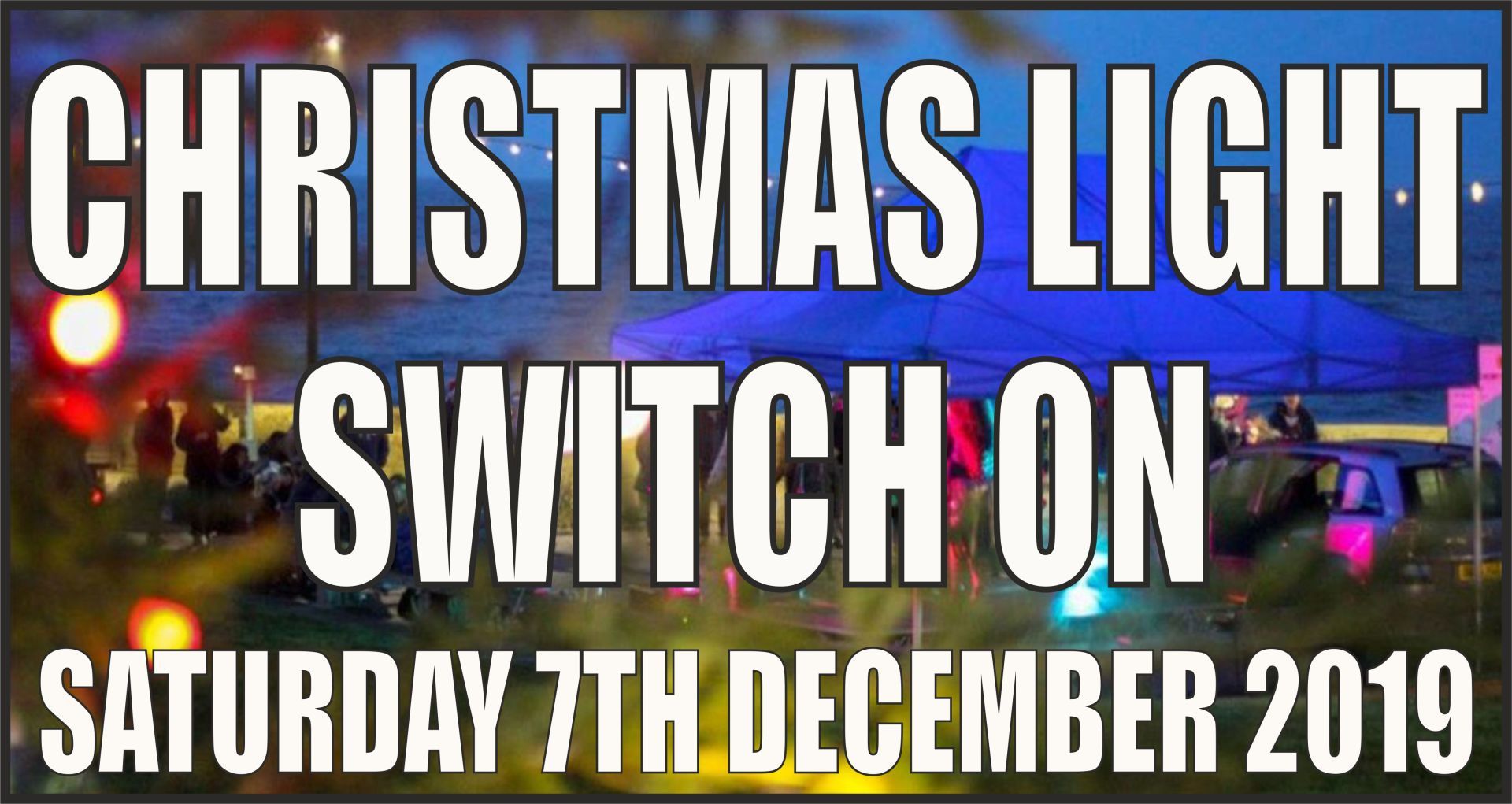 Christmas light switch on in Westward Ho!