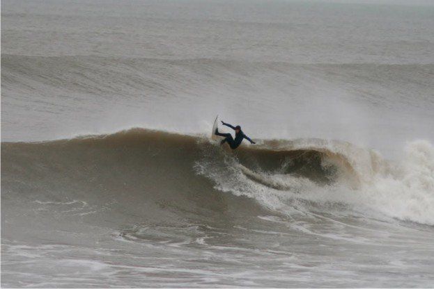 Big wave in Westward Ho! devon being surfed by a local surf school owner. Westward Ho! gets some very big Atlantic waves in the winter months