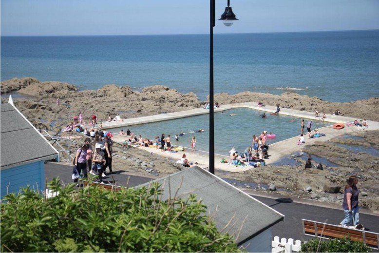 The Rock sea pool gets busy in the summer as it's a perfect, safe place to bathe in the sea. It's very shallow one side going just deep enough to swim the other.