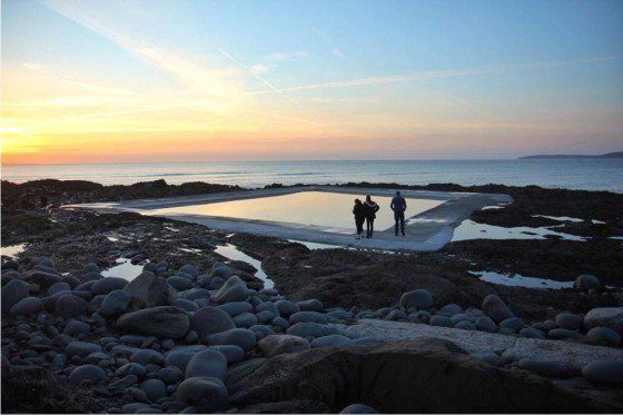 Salt water sea pool at Westward Ho! at sun set. Dip into the chilly atlantic ocean or swim in the sun set here, a relaxing and memorable experience in the village.