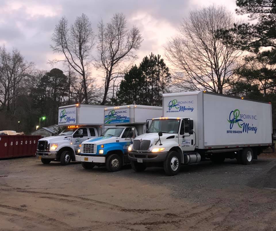 jr brown inc trucks lined up with lights on