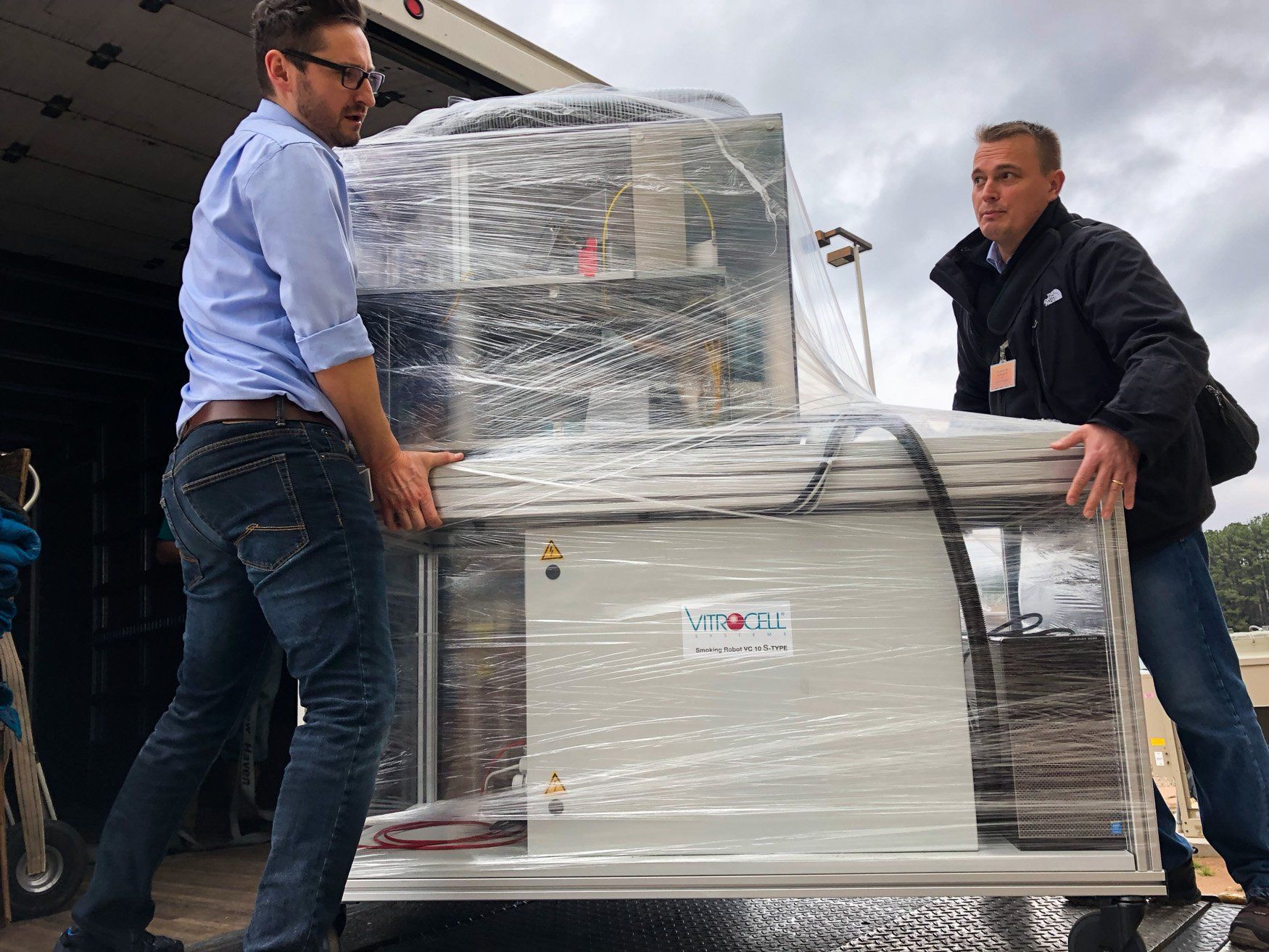 jr brown employees moving sensitive medical equipment