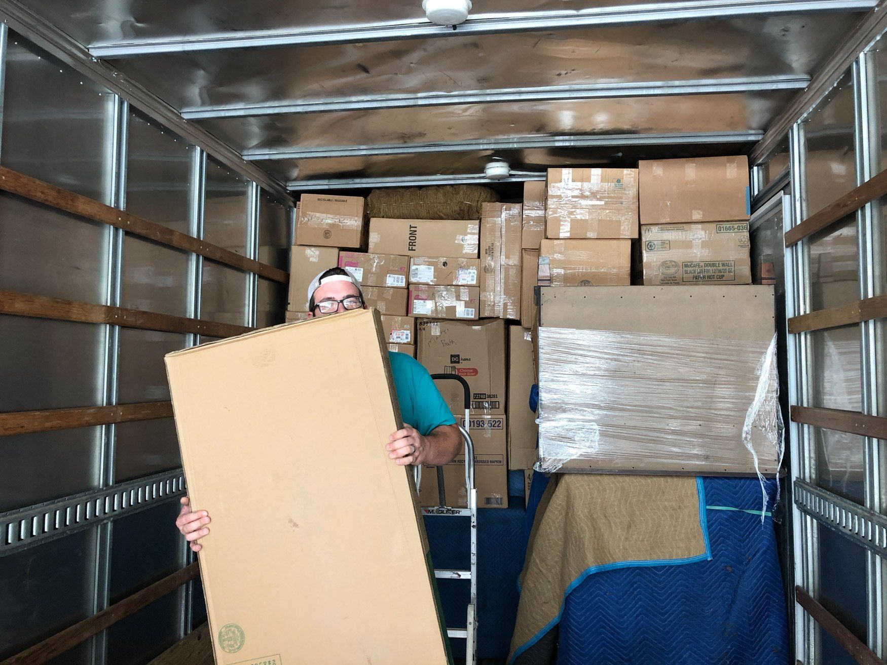 jr brown employees unloading truck