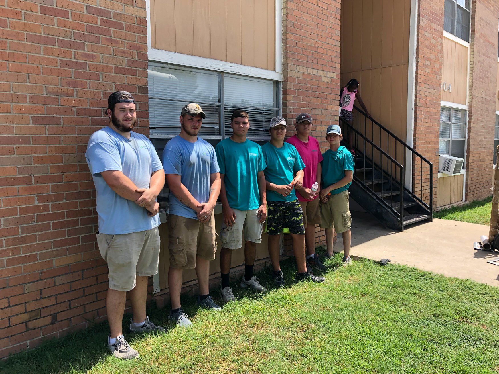 jr brown employees posing for photo