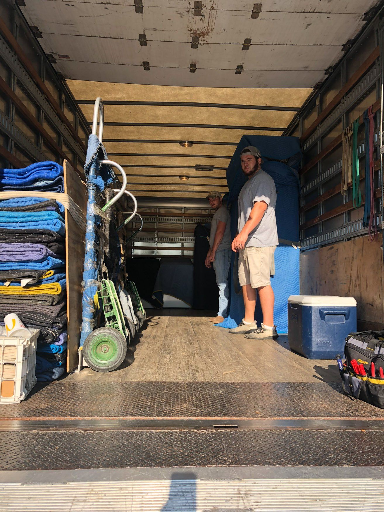 jr brown employees unloading truck for residential move