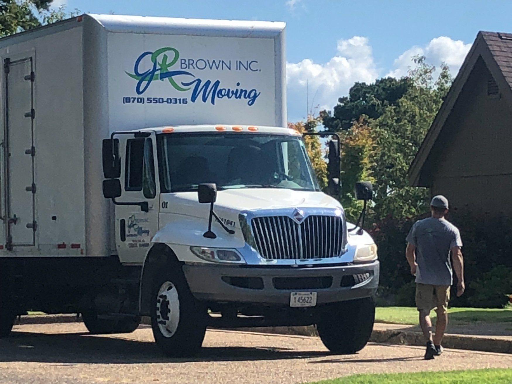 jr brown employee walking towards moving truck