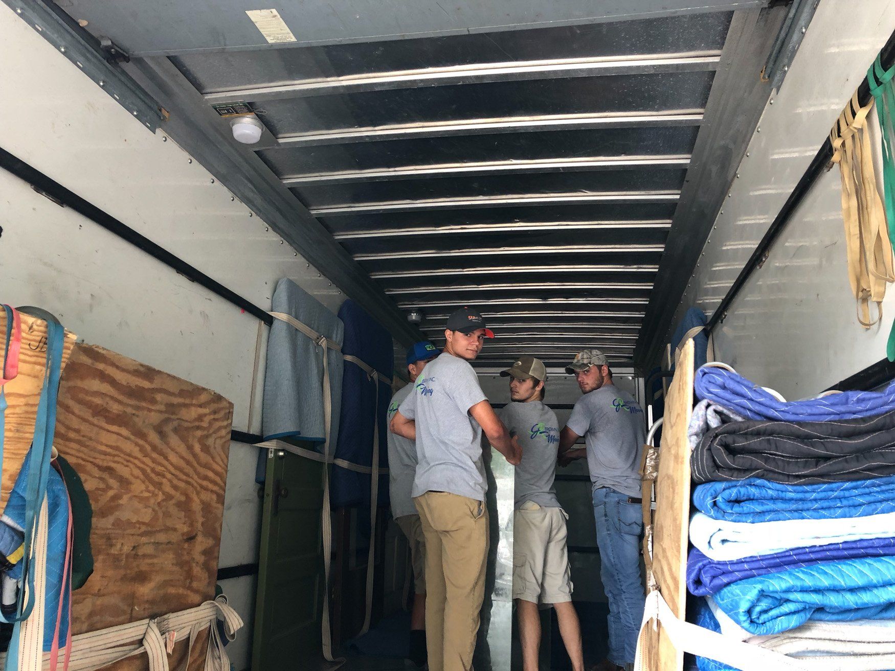 jr brown employees unloading truck
