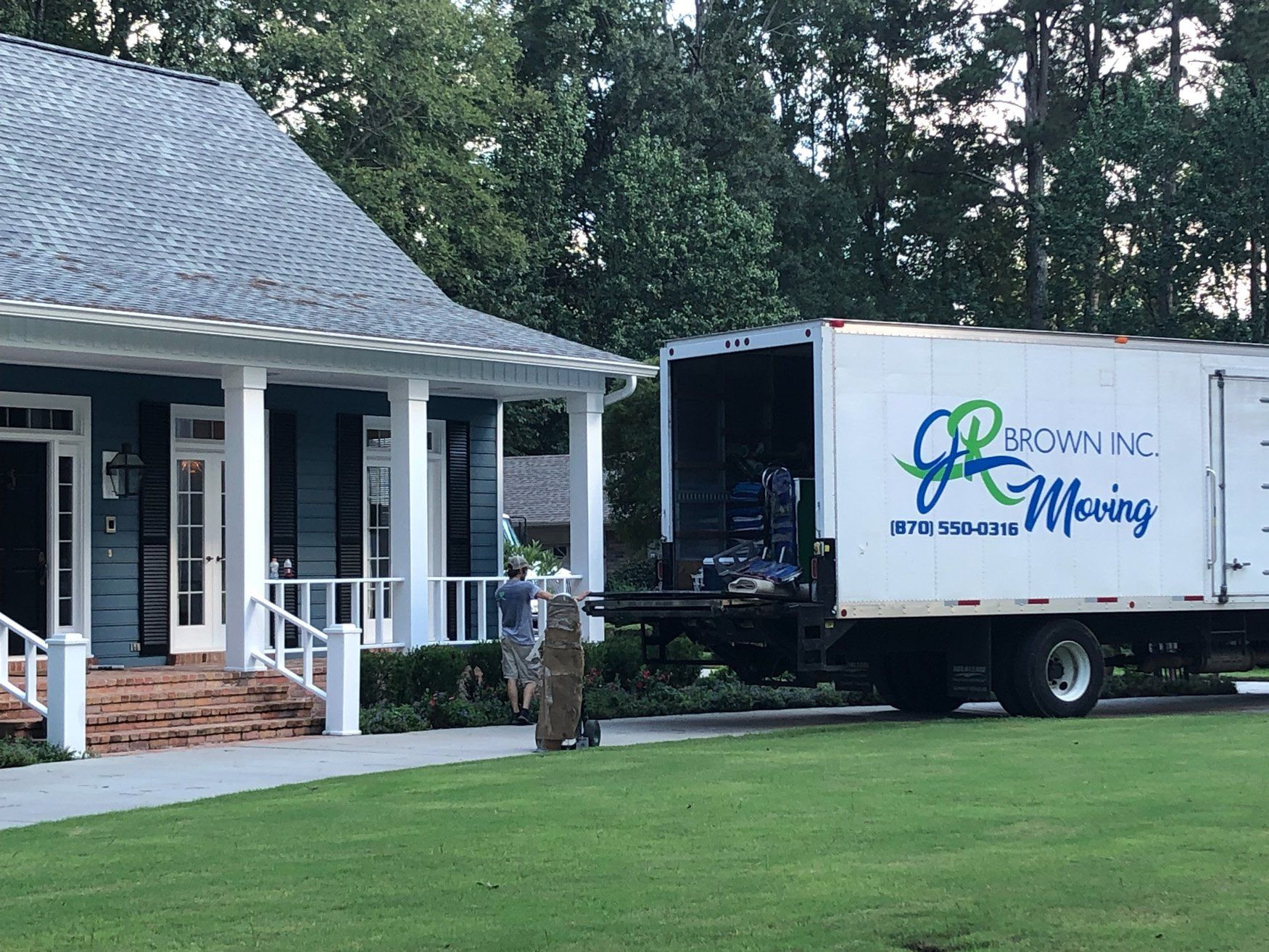 jr brown truck unloading at home