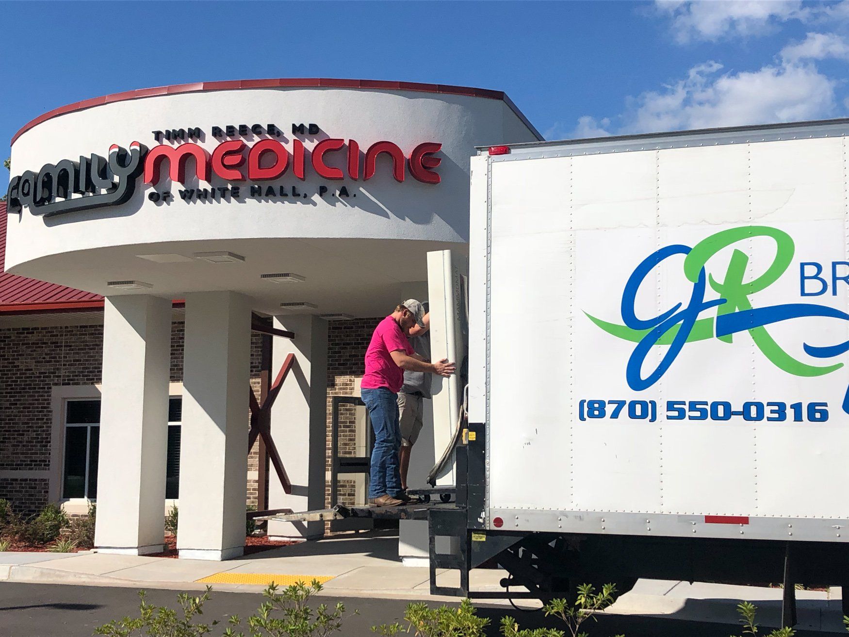 jr brown employees moving medical equipment from doctors office