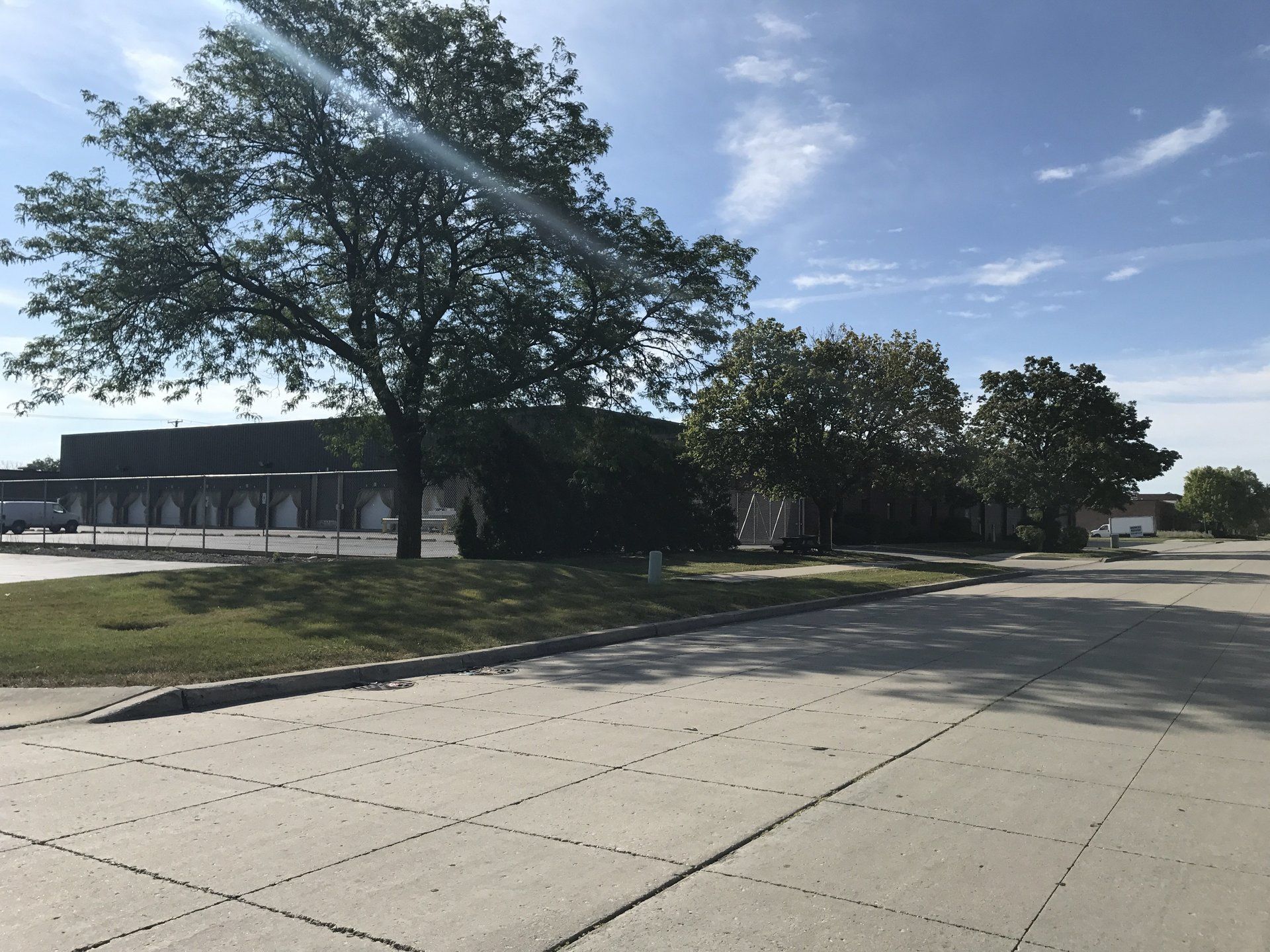 A large building with a tree in front of it