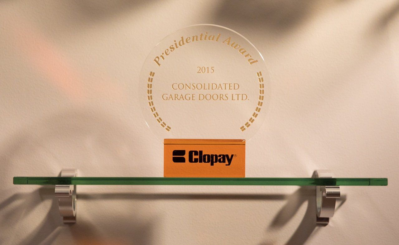 A glass plaque with the word clopray on it