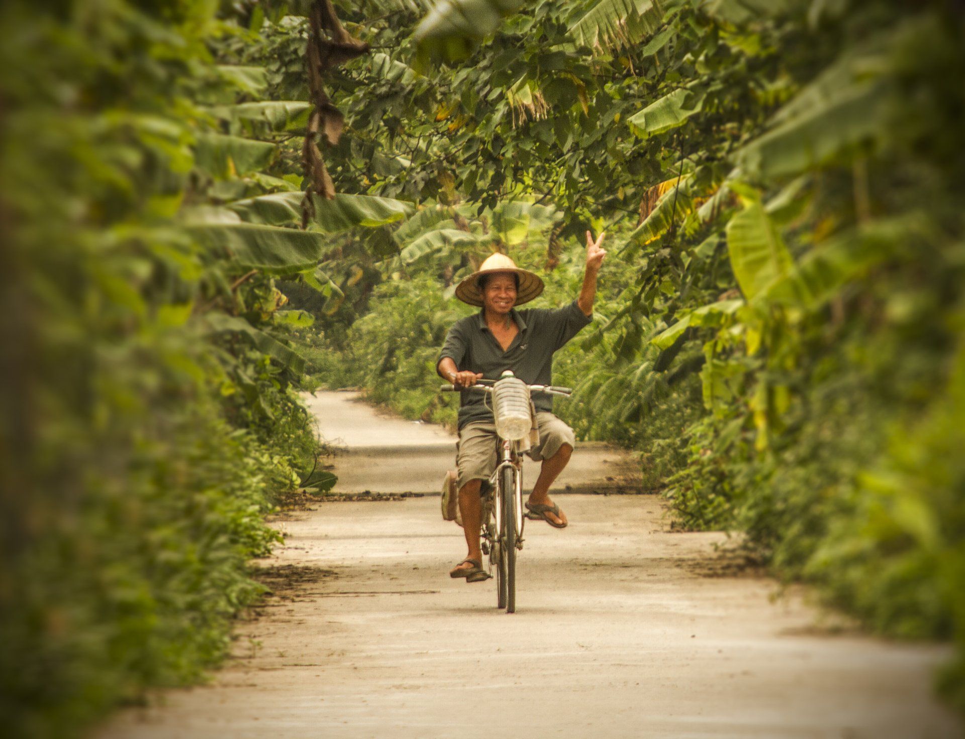 Vietnamese man bicycle in Hanoi Long Bien countryside