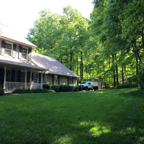Photo Of A House And A Car — Bird in Hand, PA — Operation Green Law Photo Of A Well Serviced Lawn — Bird in Hand, PA — Operation Green Law