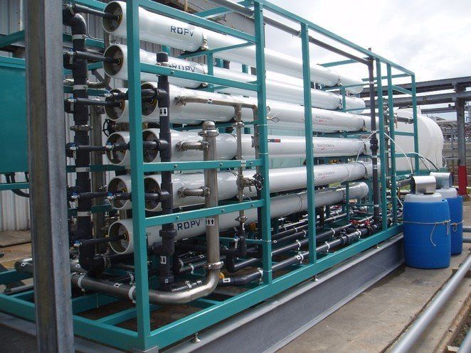 A row of pipes in a cage with the number 40 on them
