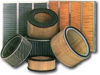 A bunch of different types of filters are sitting on top of each other.