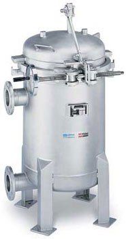 A large stainless steel tank is sitting on top of a white surface.