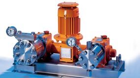 A pump with a motor and gauges on it