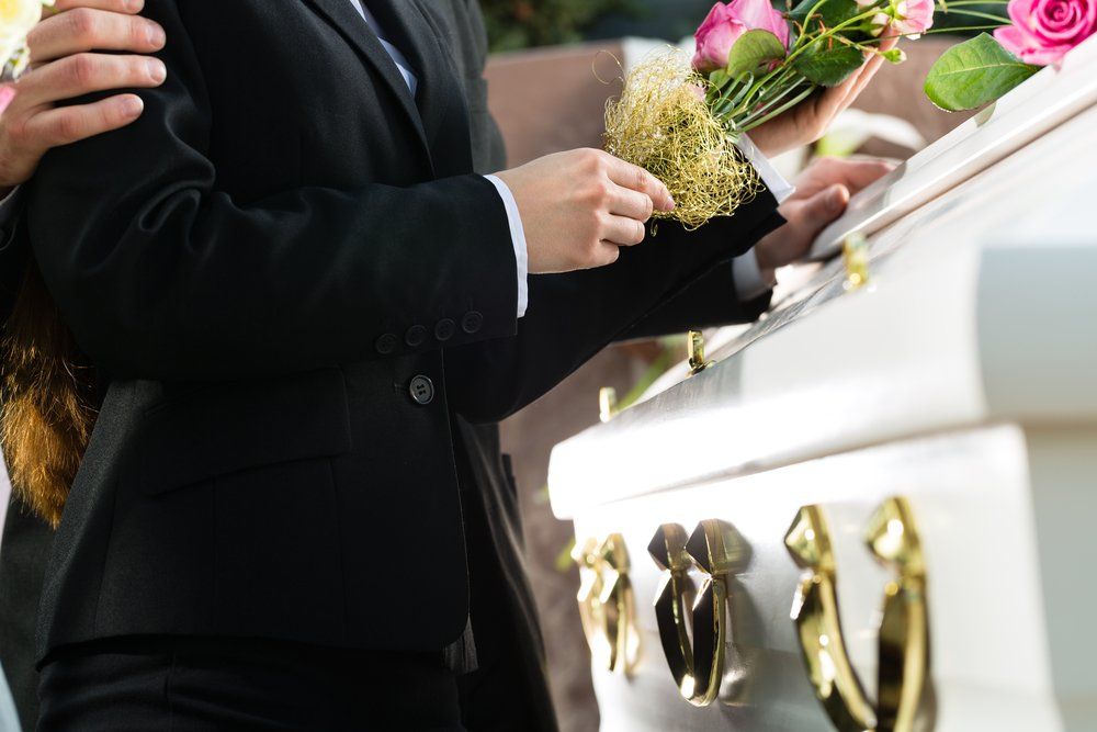 rosa rossa per funerale