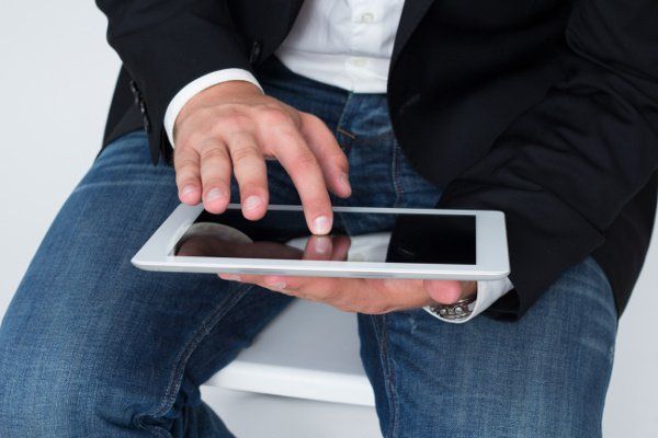 A man using his tablet