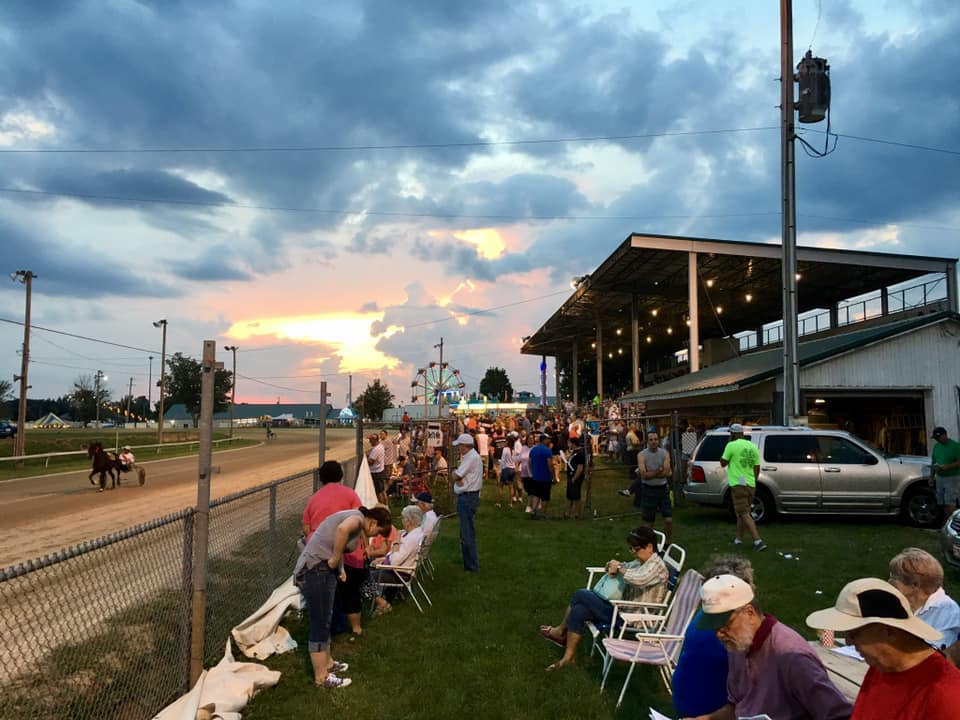 the grandstands with horse racing