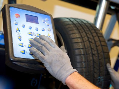 Laser wheel alignment