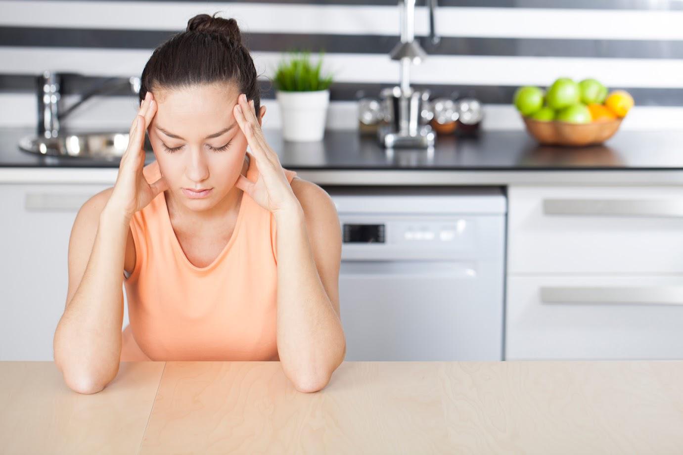Young Woman in Kitchen — Sarasota, FL — Gregory S. Rutherford, DDS, PA