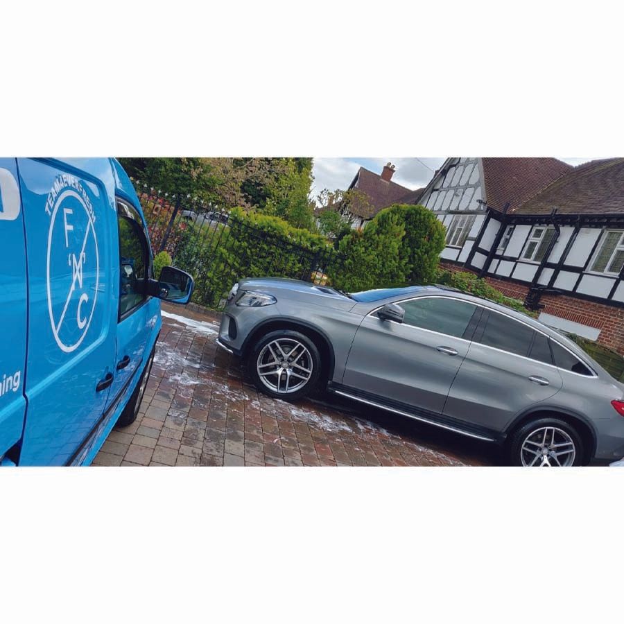 vehicle parked up with the company van next to it
