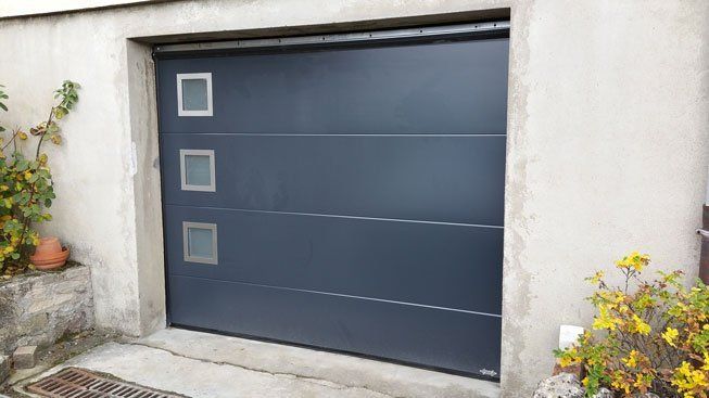 Porte de garage auto-portée réalisation Trihome