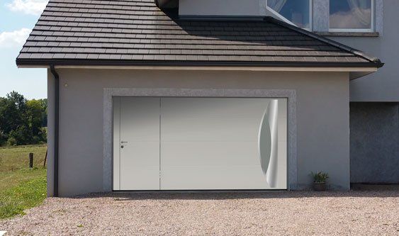 Porte de Garage grande largeur avec accès piéton réalisation Trihome