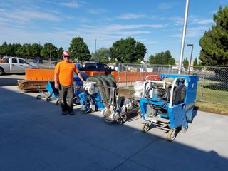 worker operating a shotblasting machine in Oregon City, OR