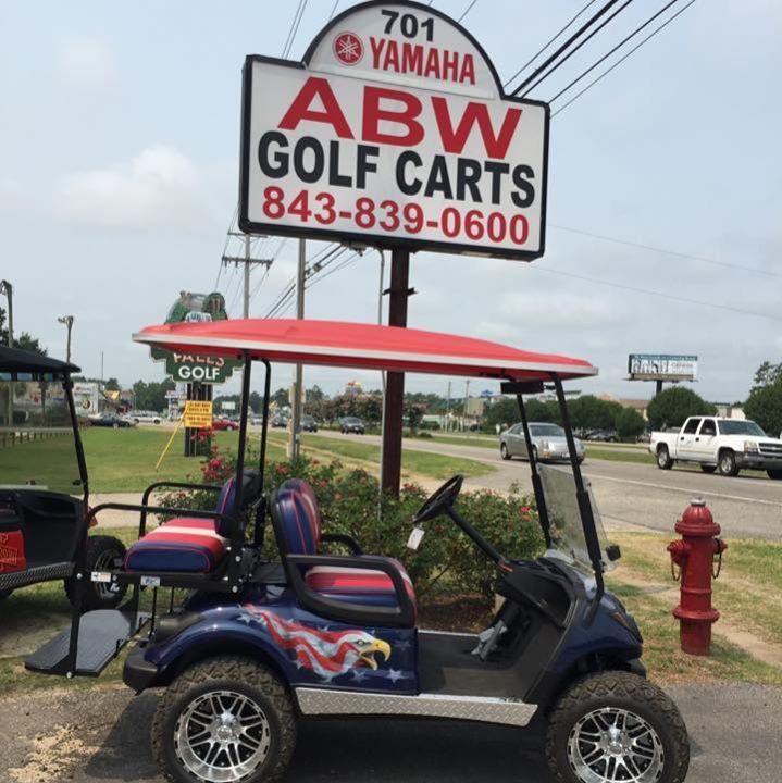 Custom New Golf Car — Golf Cart with ABW Golf Carts Sign Beside in Surfside Beach, SC