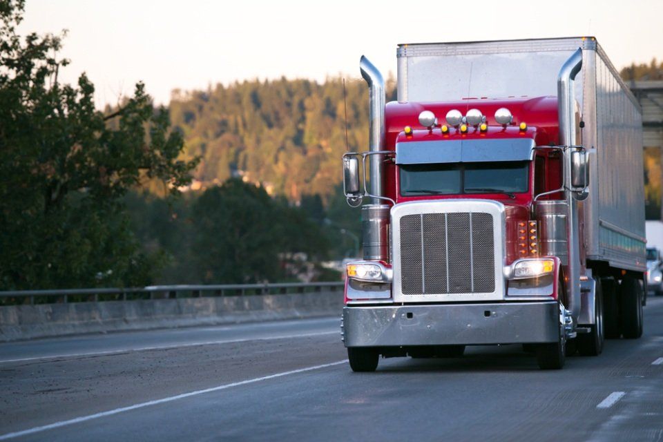 truck on it s way to deliver a parcel