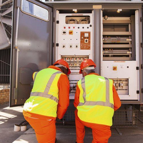 workers fixing transformer