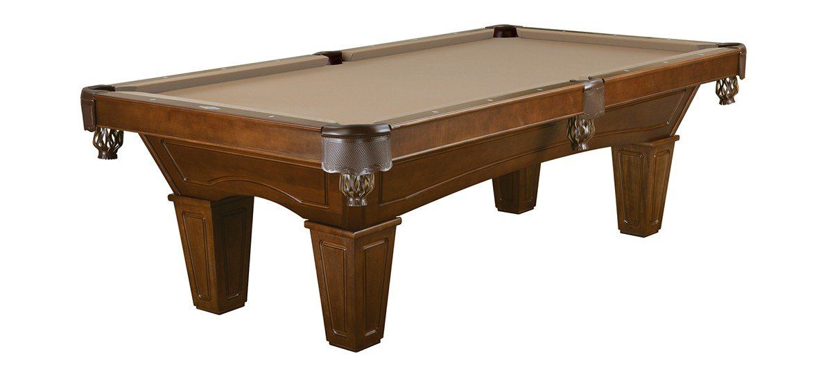Brown wooden pool table with brown felt and carved legs