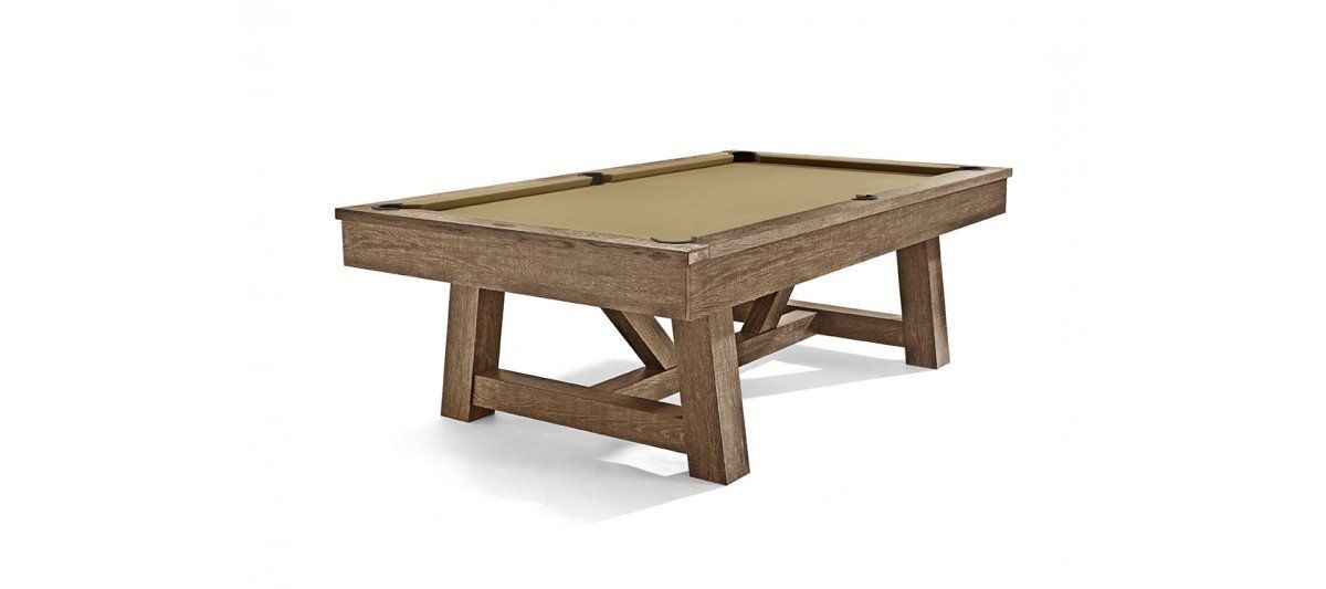 Wooden pool table with tan felt and rustic angled legs on a white background