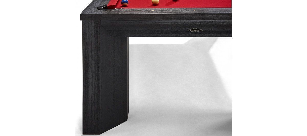 Black desk with a red top against a plain white background