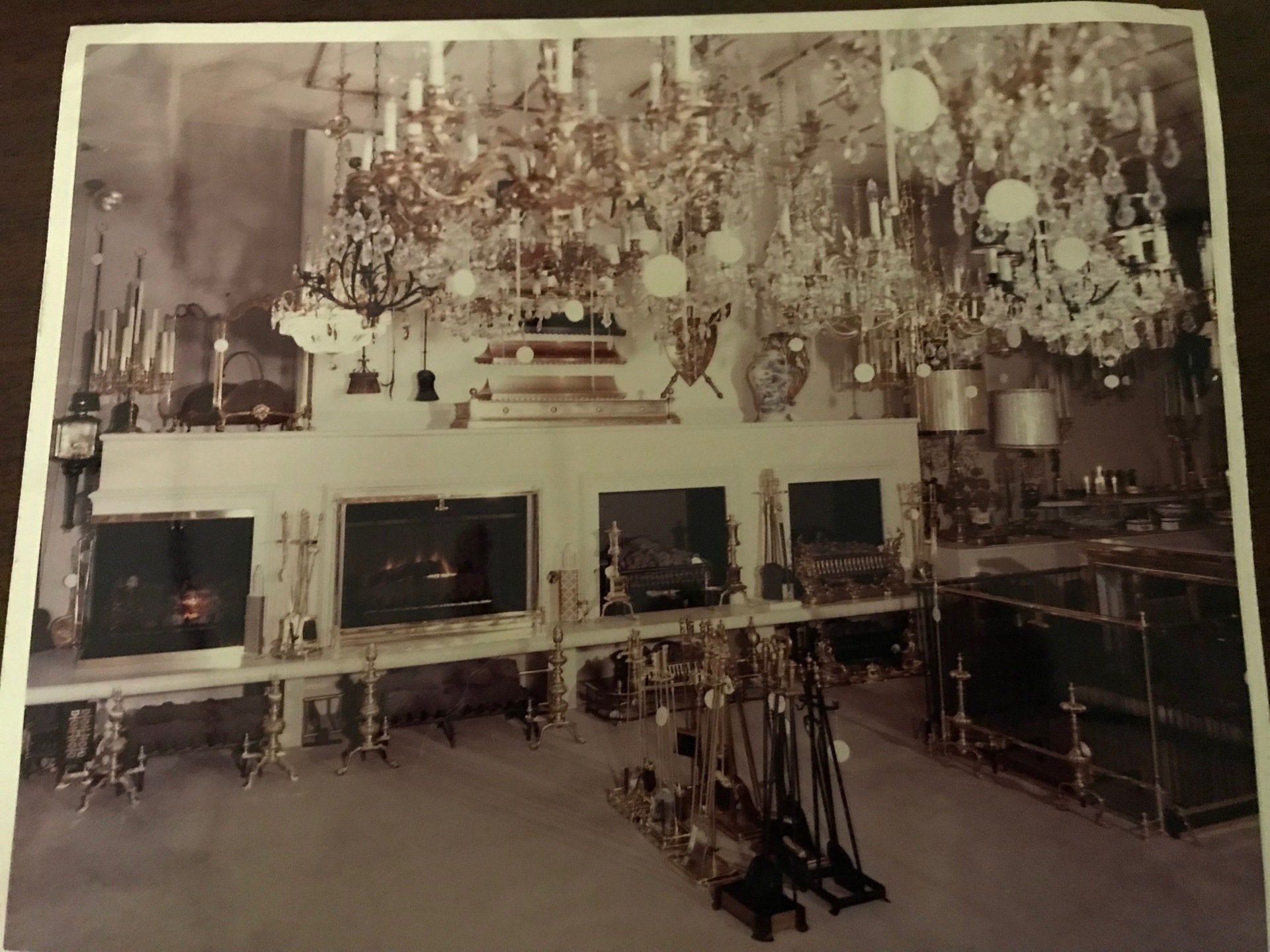 A black and white photo of a fireplace store