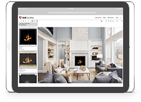 A tablet is displaying a living room with a fireplace.