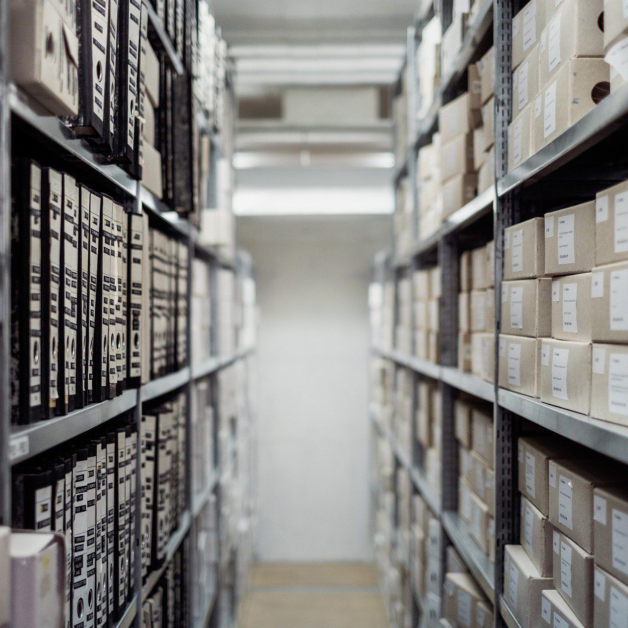 A warehouse filled with lots of boxes and binders