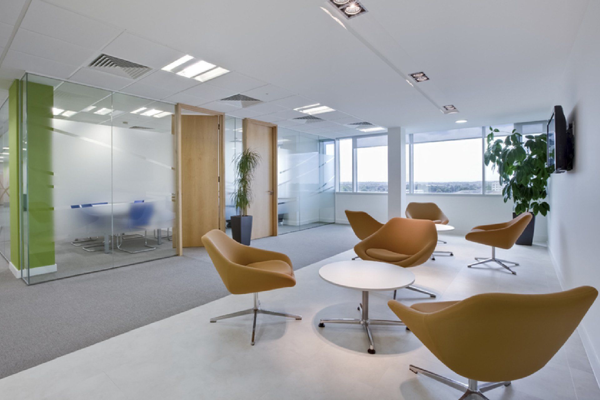a room with chairs and a table in it