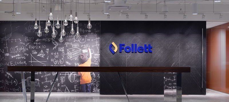 A lobby with a sign that says follett on it