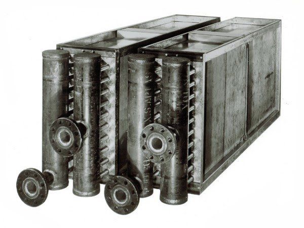 A black and white photo of a metal container