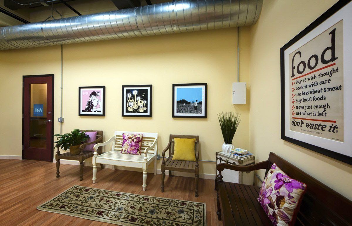 A waiting room with a sign that says food on it